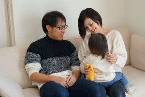大橋さんご夫婦（お子様抱いて）
